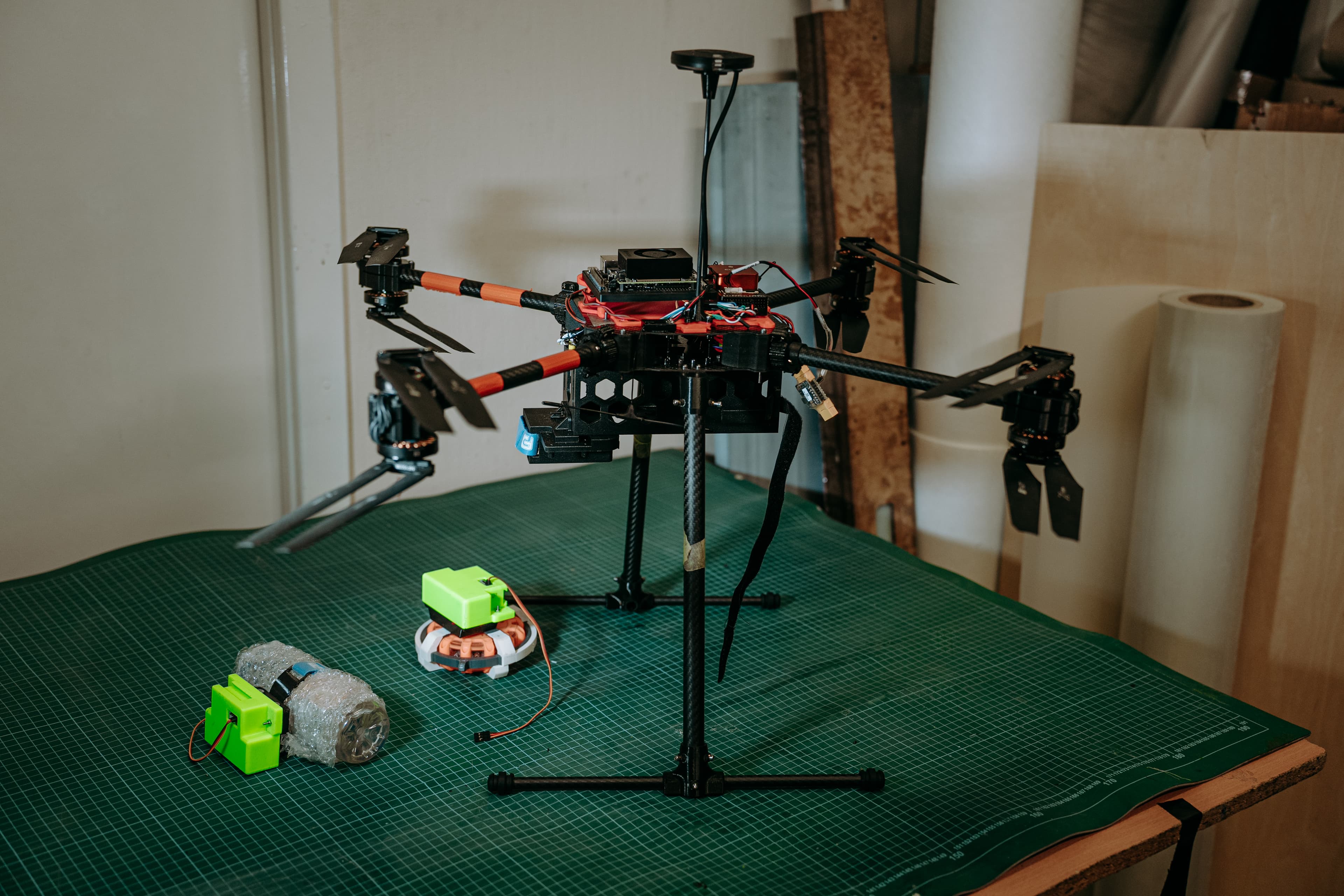 Drone in the sky, and a person in the foreground